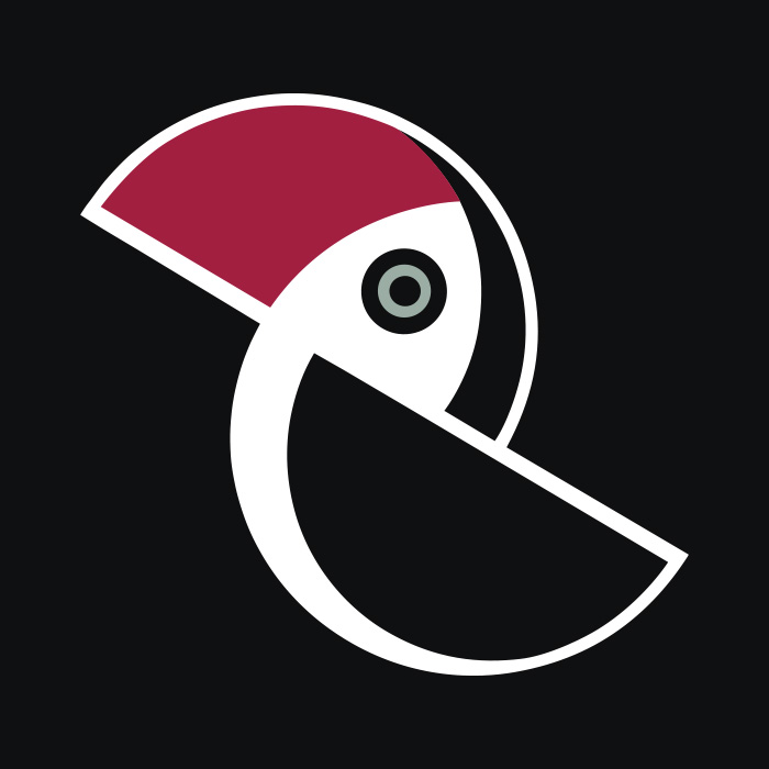 Godło PPA: stylizowany czarno-biało-czerwony tukan na czarnym tle